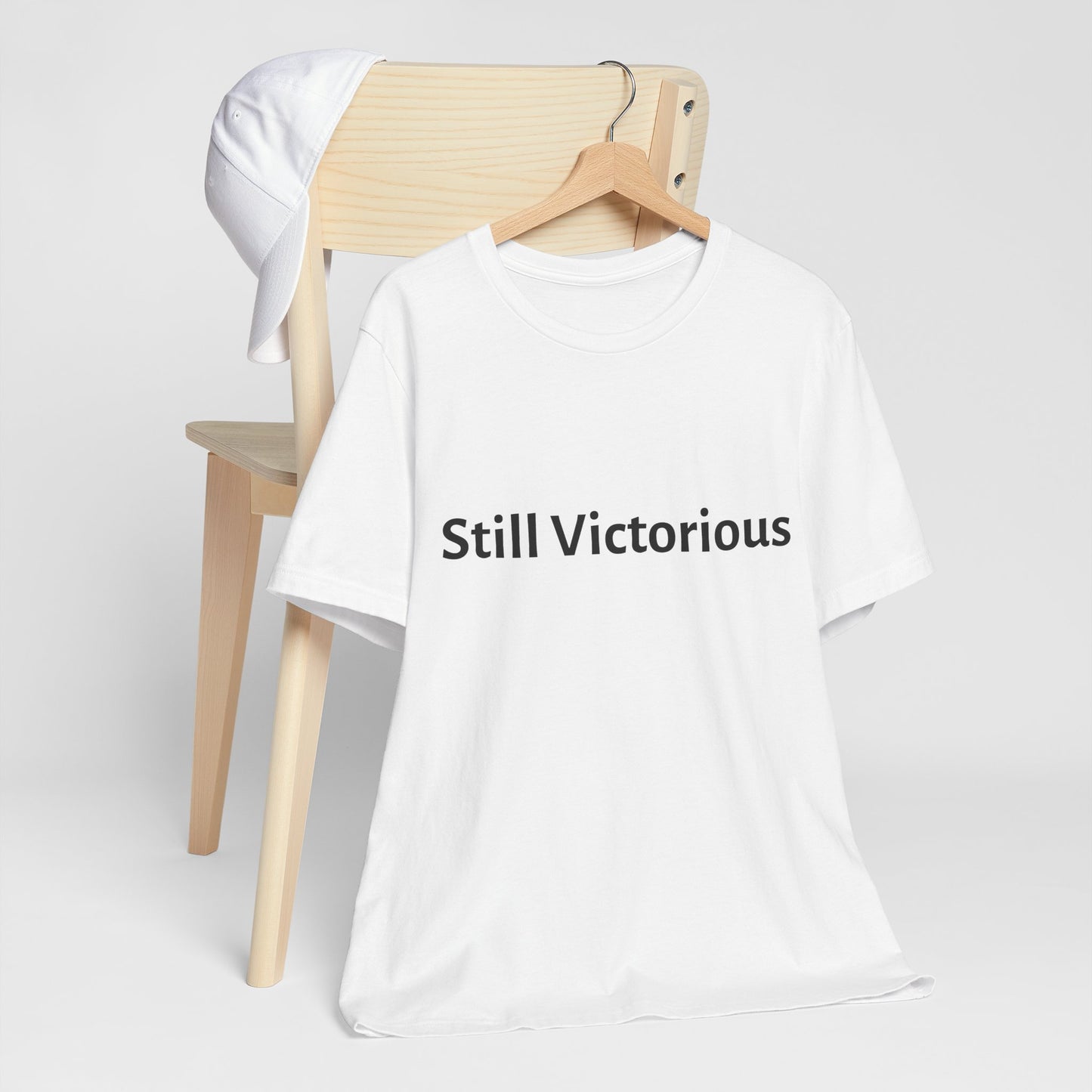 STILL VICTORIOUS - Unisex Jersey Short Sleeve Tee